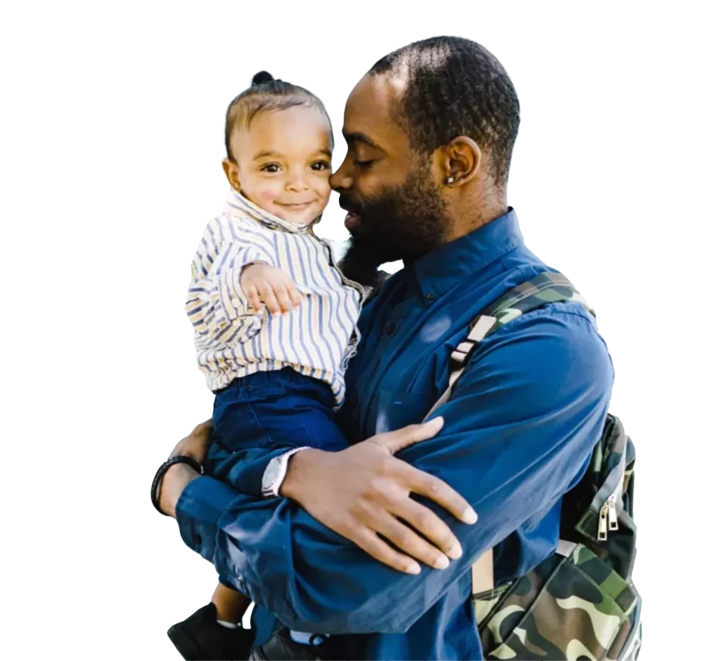 Father hugging young son, both smiling