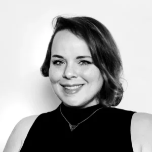 Woman smiling in black and white portrait