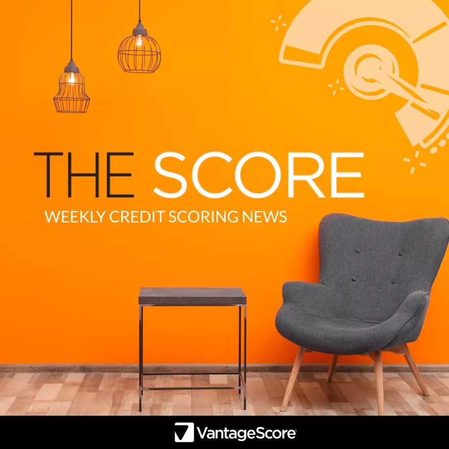 Orange office wall with 'The Score' credit news poster